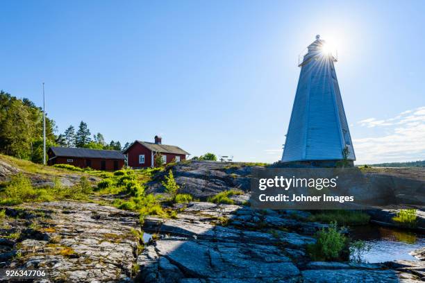 lighthouse on coast - lake vanern stock pictures, royalty-free photos & images