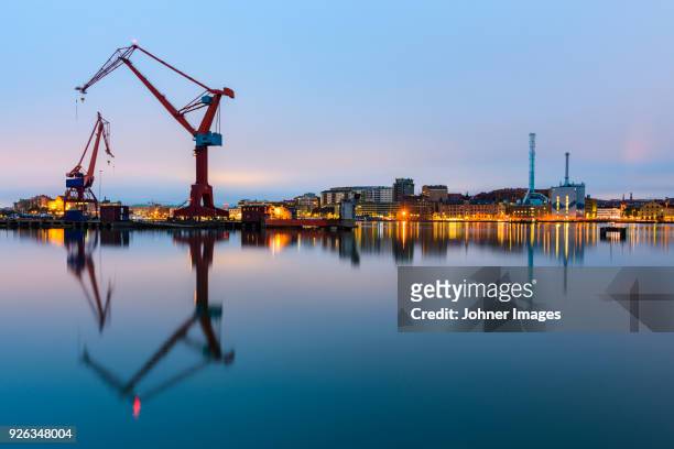 shipping cranes - goteborg stock pictures, royalty-free photos & images