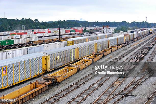 And Union Pacific railcars sit in a railyard depot in Jacksonville, Florida, U.S., on Monday, Nov. 2, 2009. Warren Buffett's Berkshire Hathaway Inc....