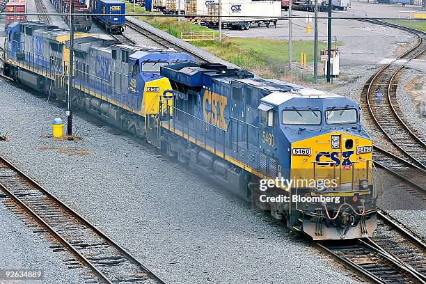 Locomotive makes its way out of a railyard depot in Jacksonville, Florida, U.S., on Wednesday, Oct. 28, 2009. Warren Buffett's Berkshire Hathaway...