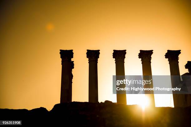 sunset at córdoba roman temple - highlywood stock pictures, royalty-free photos & images