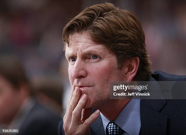 Head coach Mike Babcock of the Detroit Red Wings looks on from the bench during their game against the Vancouver Canucks at General Motors Place on...