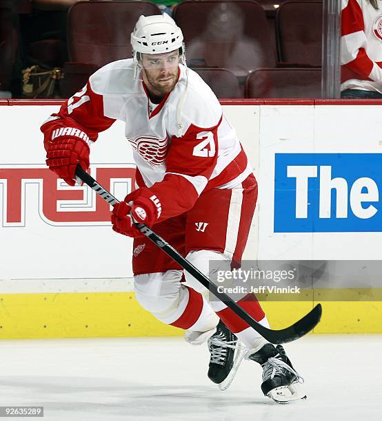 Ville Leino of the Detroit Red Wings passes the puck up ice during their game against the Vancouver Canucks at General Motors Place on October 27,...