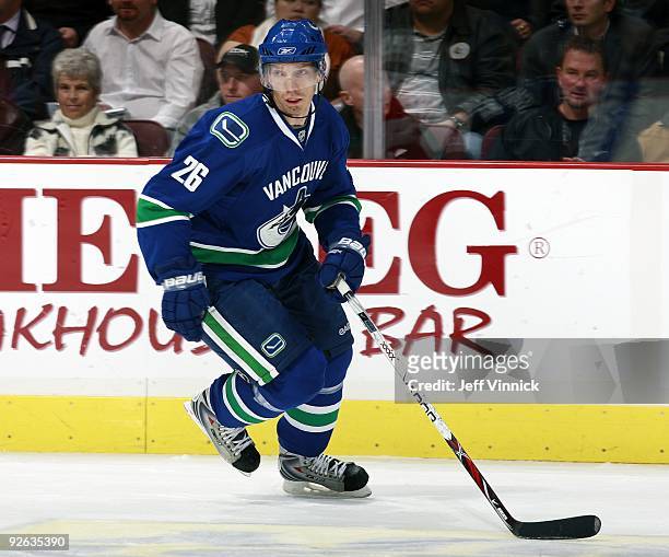 Mikael Samuelsson of the Vancouver Canucks skates up ice during their game against the Detroit Red Wings at General Motors Place on October 27, 2009...