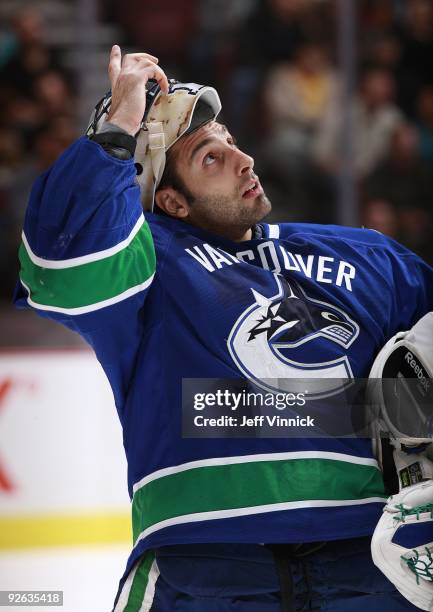 Roberto Luongo of the Vancouver Canucks watches a replay during their game against the Detroit Red Wings at General Motors Place on October 27, 2009...