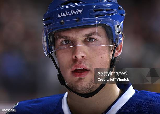 Sergei Shirokov of the Vancouver Canucks looks on from the bench during their game against the Detroit Red Wings at General Motors Place on October...