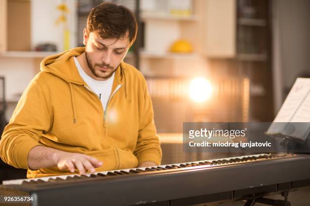 never too late to start playing an instrument - electric piano stock pictures, royalty-free photos & images