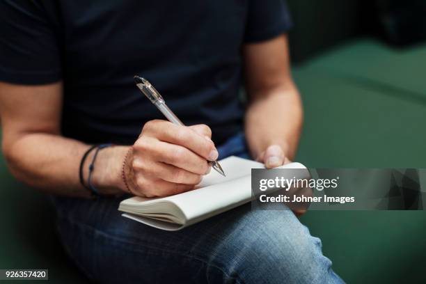 Noting Down 16,919 Guy Writing Down Note Stock Photos, High-Res Pictures, and ...