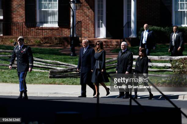President Donald Trump, first lady Melania Trump, U.S. Vice President Mike Pence and his wife, second lady Karen Pence arrive to join mourners paying...