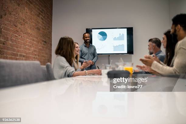 young man has a presentation with the graph on an lcd screen - plug socket stock pictures, royalty-free photos & images