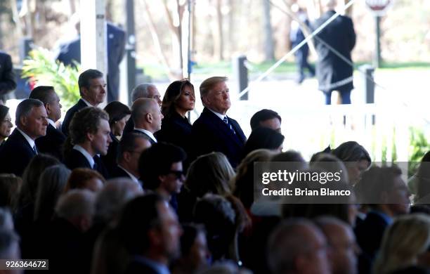 President Donald Trump, first lady Melania Trump, U.S. Vice President Mike Pence and his wife, second lady Karen Pence join mourners paying their...