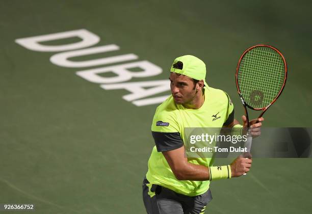 Malek Jaziri of Tunisia in action during his semi final match against Roberto Bautista Agut of Spain on day five of the ATP Dubai Duty Free Tennis...