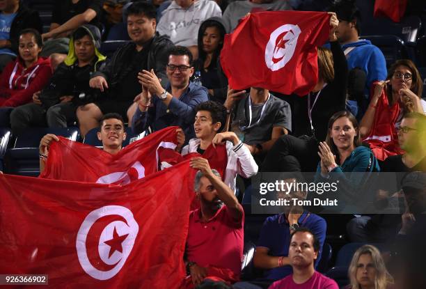 Tunisian fans celebrate during the semi final match between Roberto Bautista Agut of Spain and Malek Jaziri of Tunisia on day five of the ATP Dubai...