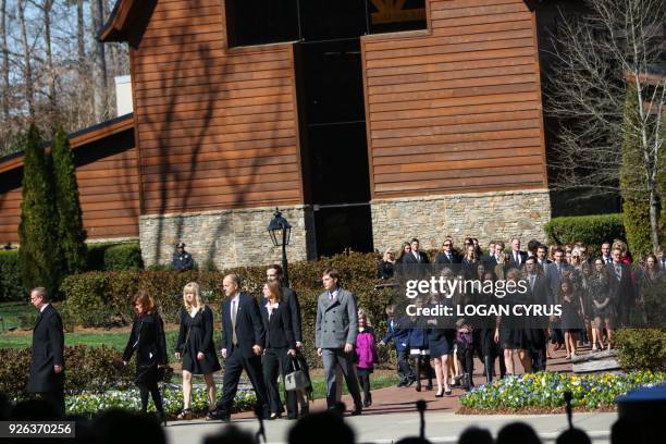 Family and friends make their way to their sets at the funeral of Reverend Dr. Billy Graham in Charlotte, North Carolina. Graham, who preached to...