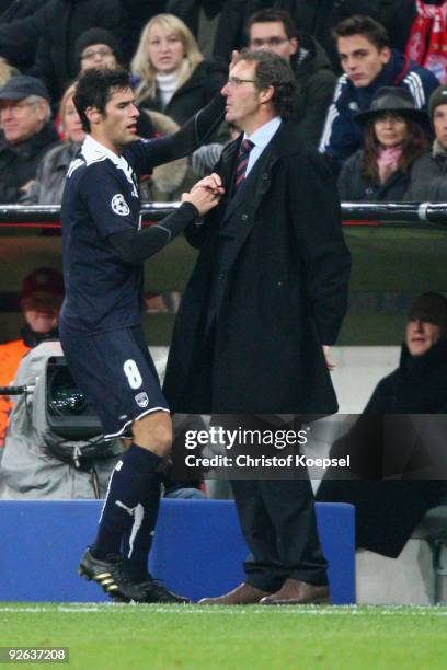 Yoann Gourcuff of Bordeaux celebrates his team's first goal with head coach Laurent Blanc of Bordeaux during the UEFA Champions League Group A match...