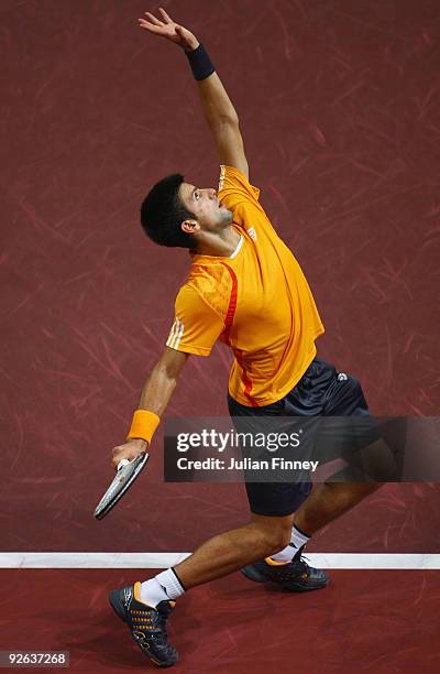 Novak Djorkovic of Serbia in action in his match against Andreas Beck of Germany during Day Two of the Davidoff Swiss Indoors Tennis at St...