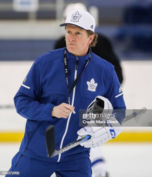 Head coach Mike Babcock of the Toronto Maple Leafs skates during team practice a day before their outdoor NHL Stadium Series Game against the...