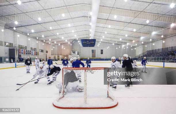 Toronto Maple Leafs players take part in team practice a day before their outdoor NHL Stadium Series Game against the Washington Capitals, at the...