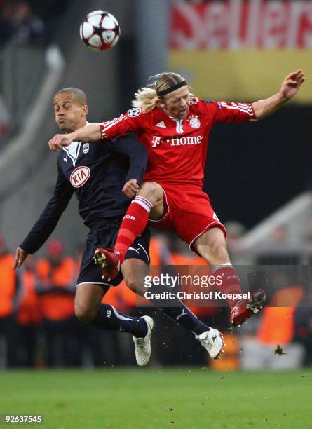 Wendel of Bordeaux and Anatoliy Tymoshchuk of Bayern jump for a header during the UEFA Champions League Group A match between FC Bayern Muenchen and...