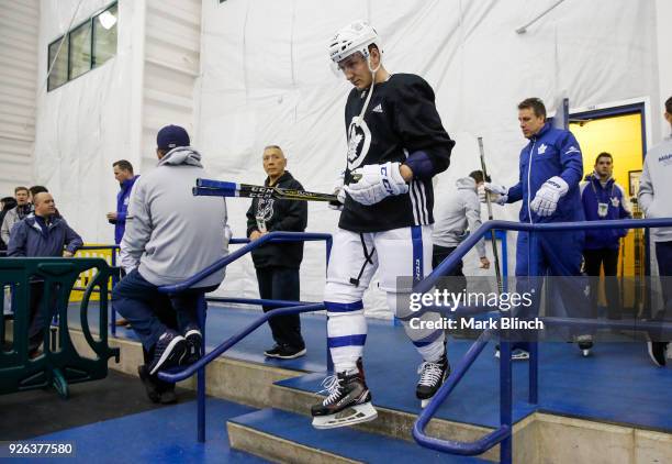 Travis Dermott of the Toronto Maple Leafs takes the ice for practice a day before their outdoor NHL Stadium Series Game against the Washington...