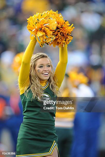 Green Bay Packers cheerleader performs during an NFL game against the Minnesota Vikings at Lambeau Field on November 1, 2009 in Green Bay, Wisconsin.