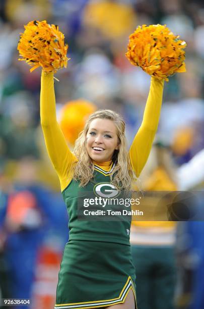 Green Bay Packers cheerleader performs during an NFL game against the Minnesota Vikings at Lambeau Field on November 1, 2009 in Green Bay, Wisconsin.