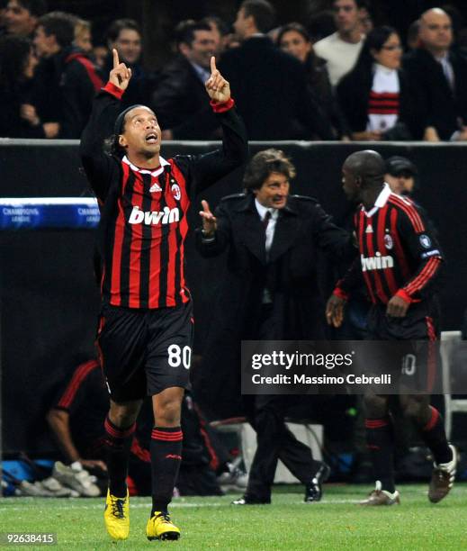 Ronaldinho of AC Milan Celebrates after scoring a penalty during the UEFA Champions League group C match between AC Milan and Real Madrid at the...