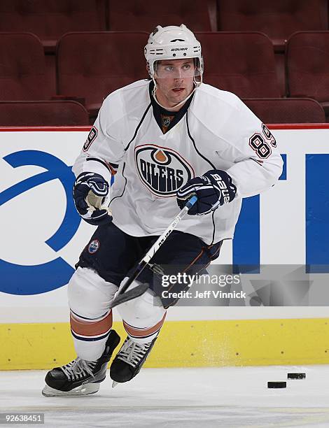 Sam Gagner of the Edmonton Oilers skates up ice during their game against the Vancouver Canucks at General Motors Place on October 25, 2009 in...