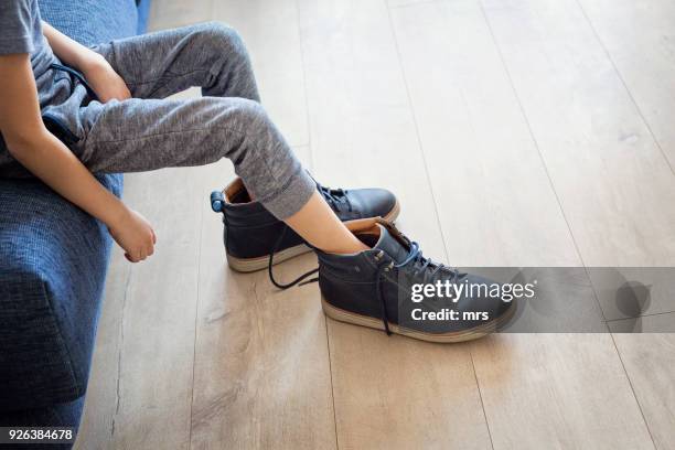 little feet, big shoes - part of something bigger stock pictures, royalty-free photos & images