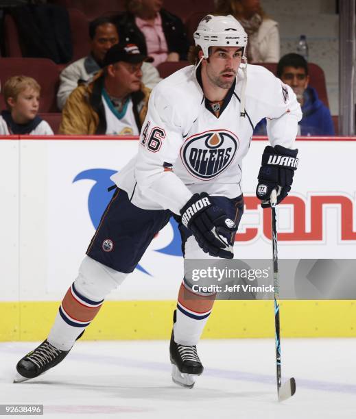 Zack Stortini of the Edmonton Oilers skates up ice during their game against the Vancouver Canucks at General Motors Place on October 25, 2009 in...