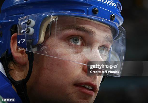 Mason Raymond of the Vancouver Canucks looks on from the bench during their game against the Edmonton Oilers at General Motors Place on October 25,...