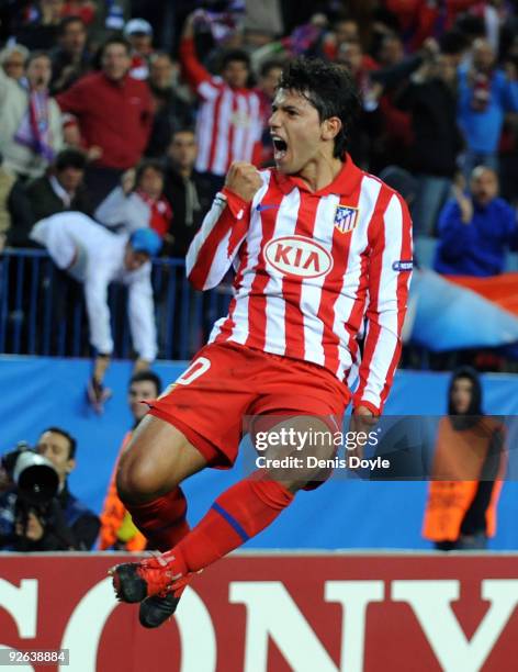 Sergio Aguero of Atletico Madrid celebrates after scoring his second goal against Chelsea during the UEFA Champions League Group D match on November...