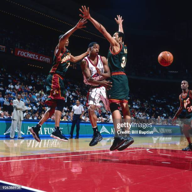 Steve Francis of the Houston Rockets passes the ball during a game played circa 2001 at the Compaq Center in Houston, Texas. NOTE TO USER: User...