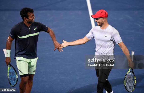 Jamie Cerretani of United States and Leander Paes of India celebrate a point during their semi final match against Damir Dzumhur of Bosnia and...