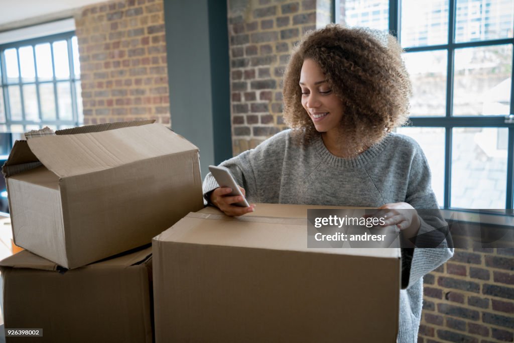 Happy woman moving house