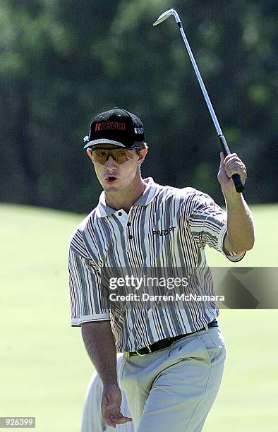 Scott Laycock from Victoria, rides home a putt on the 17 th., during the third round of the 2001 ANZ Victorian Open Championship, which is being...