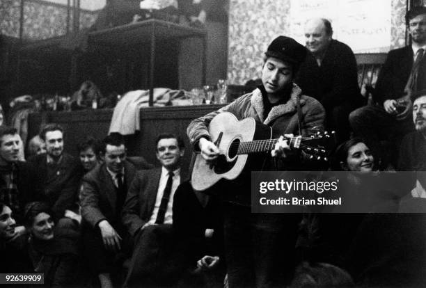 Photo of Bob DYLAN; performing at the Singers Club Christmas party on his first visit to Britain