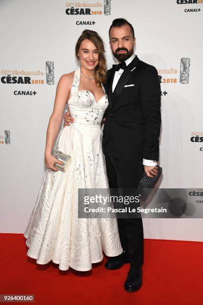 Deborah François and a guest arrive at the Cesar Film Awards 2018 At Salle Pleyel on March 2, 2018 in Paris, France.