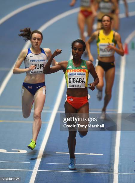 Genzebe Dibaba of Ethiopia wins her Women's 800m heat from Laura Muir of Great Britain during Day Two of the IAAF World Indoor Championships at Arena...