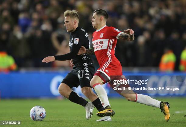 Leeds United's Samuel Saiz and Middlesbrough's Mo Besic battle for the ball during the Sky Bet Championship match at the Riverside Stadium,...