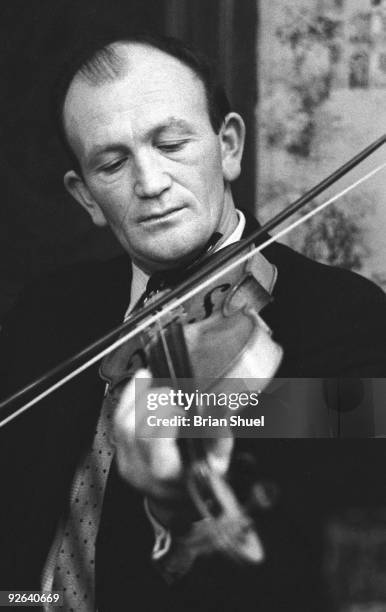 Photo of Bobby CASEY; Bobby Casey, fiddle player from Co Clare, performing at a Sunday lunchtime session in the Bedford Arms, Camden Town