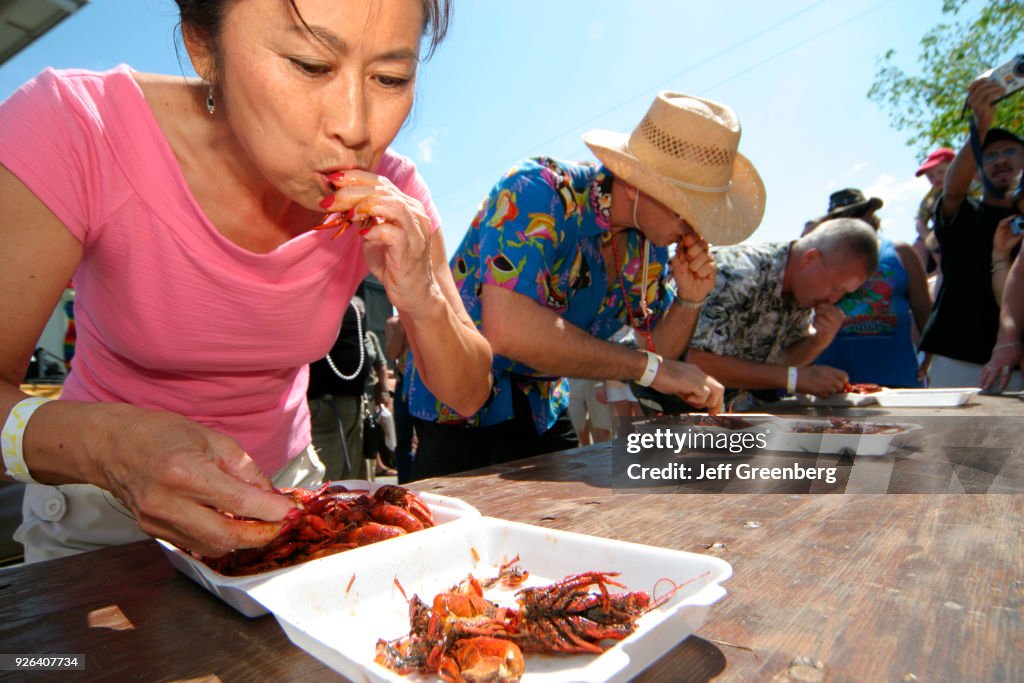 A boiled crawfish eating contest at the Cajun Zydeco Crawfish Festival.