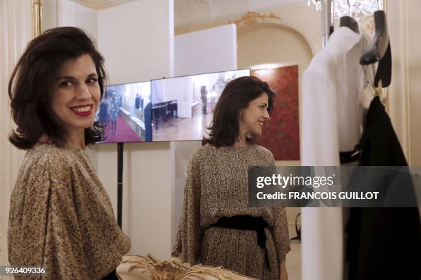 Fashion designer Vanessa Seward poses backstage before her 2018/2019 fall/winter collection fashion show on March 2, 2018 in Paris. / AFP PHOTO /...