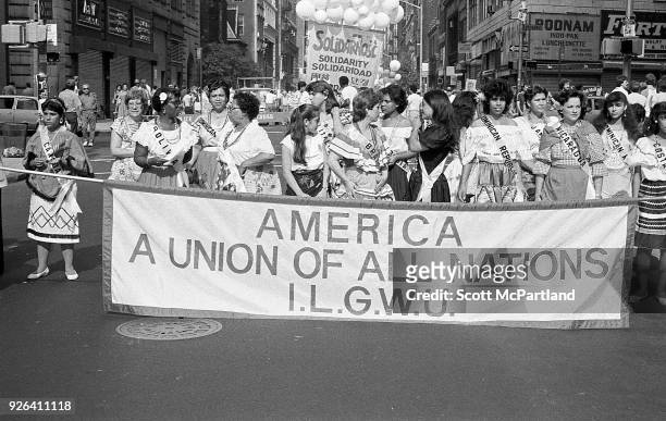 New York - Women garment workers with the ILGWU, march on Broadway. They are protesting the increased clothing and textile imports that union...