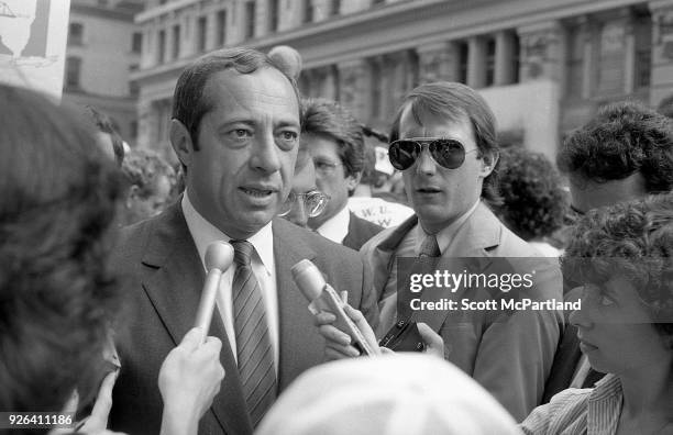 New York - Governor Mario Cuomo talks with reporters on the streets of New York City. Governor Cuomo is pushing the Bond Issue, where voters will be...