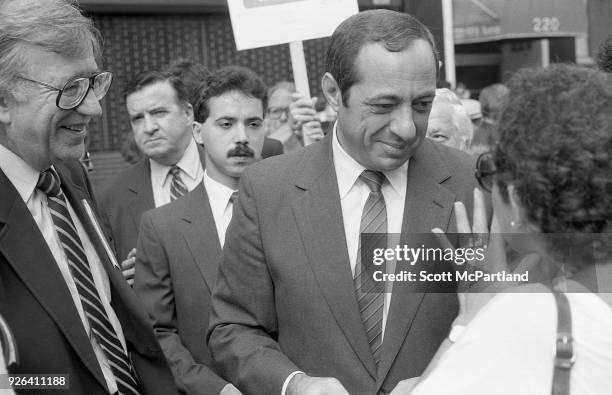 New York - Governor Mario Cuomo talks with a voter on the streets of New York City about his Bond Issue proposal. This proposal will ask voters to...