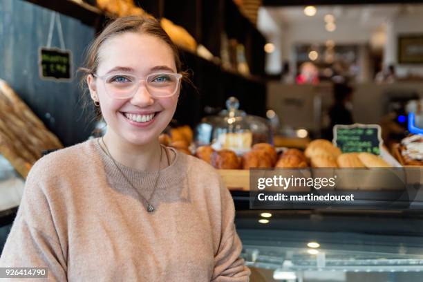 Portrait of young woman in a local coffee shop.