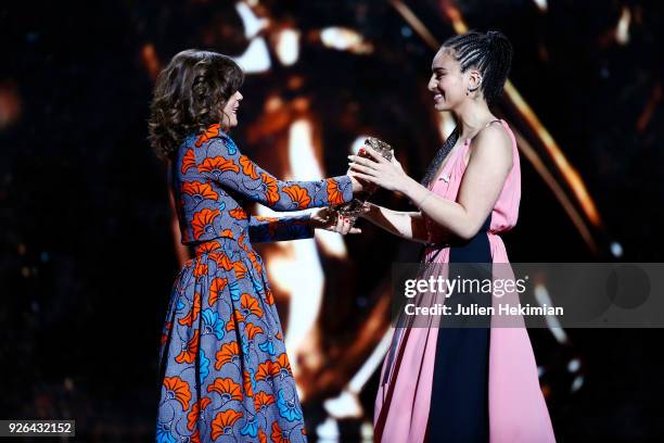 Camelia Jordana receives rom by Blanche Gardin the best newcomer female actor Award for the movie "Le Brio" f during the Cesar Film Awards 2018 at...