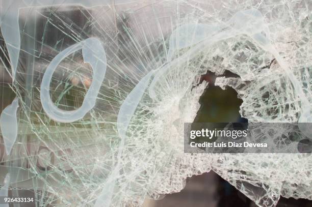 smashed cafeteria  window - christmas thief stock pictures, royalty-free photos & images