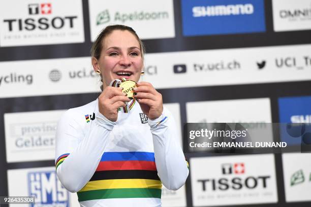 Gold medalist Germany's Kristina Vogel celebrates on the podium after taking part in the women's sprint final during the UCI Track Cycling World...